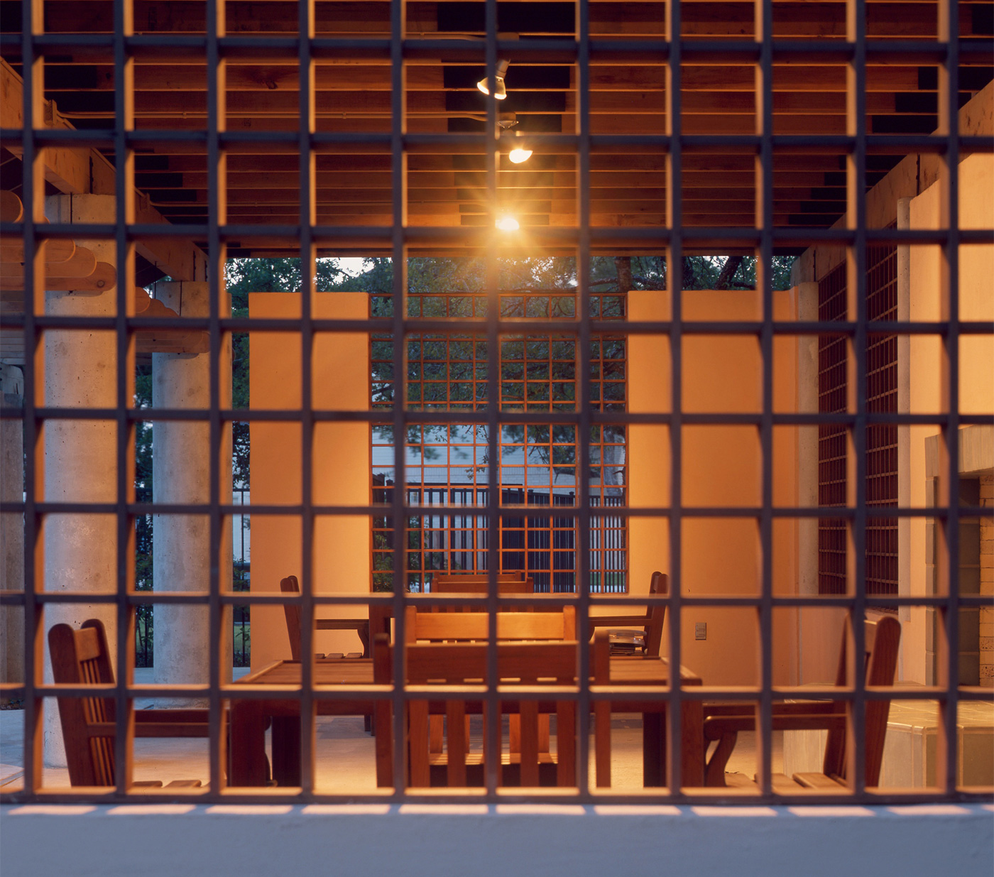 View of patio tables in an awning structure.