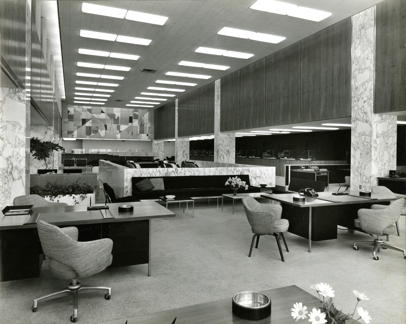 Black and white photo of banks interior in the 60s