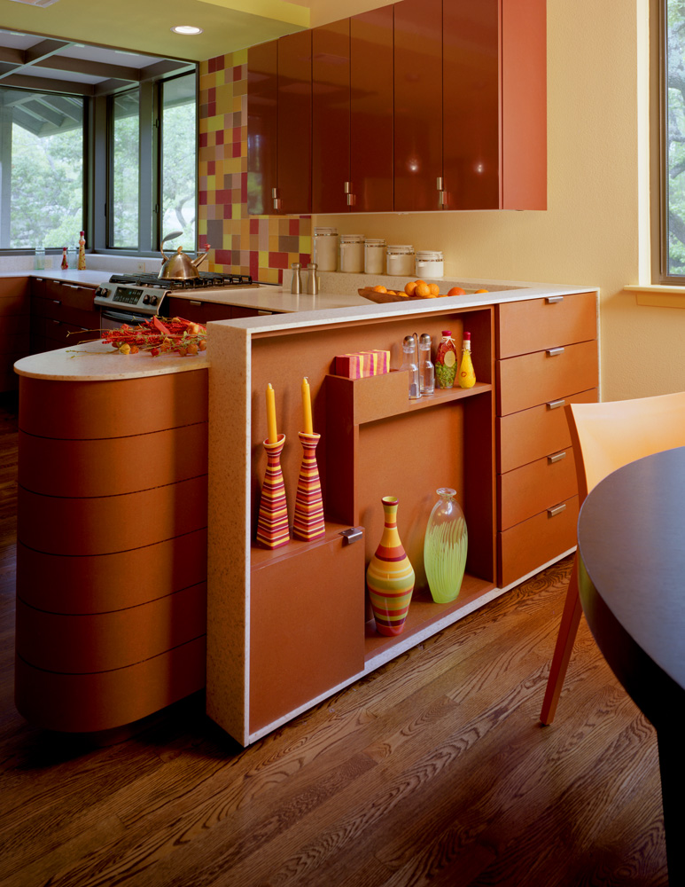 Counter between a kitchen and dining table.