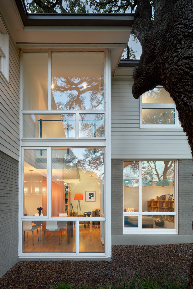 A 2-floor window wall of a home.