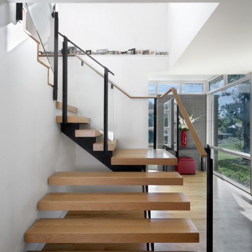 minimalist winding staircase of a home.