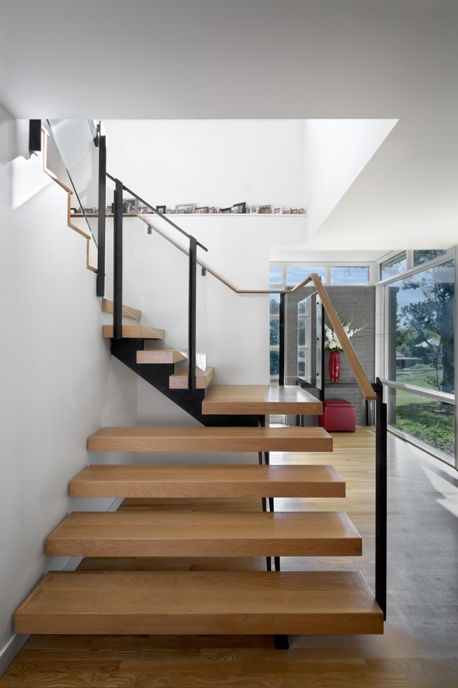 minimalist winding staircase of a home.
