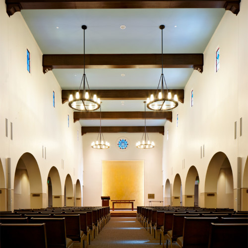 Rows of church pews.