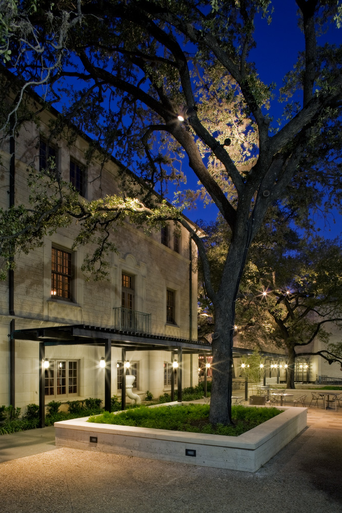 The patio of a university building at night