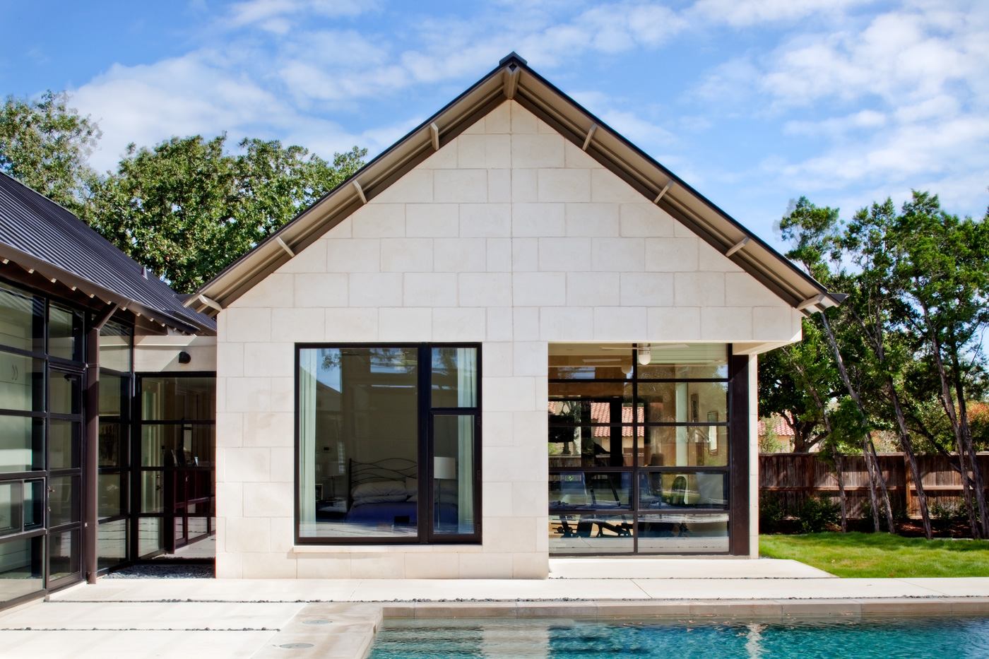 Rear of a house and its pool.