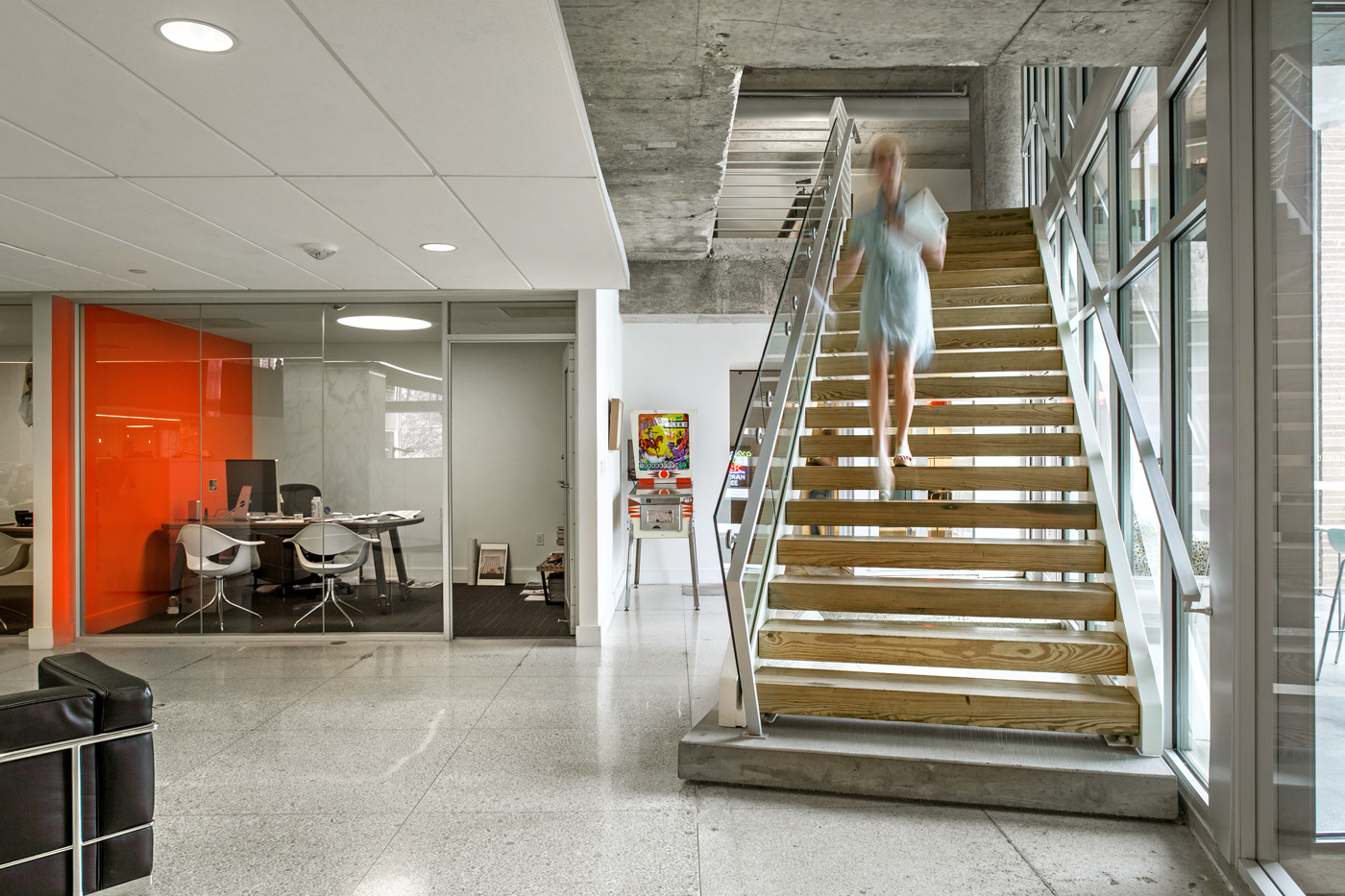 Women walking downstairs of an office building.