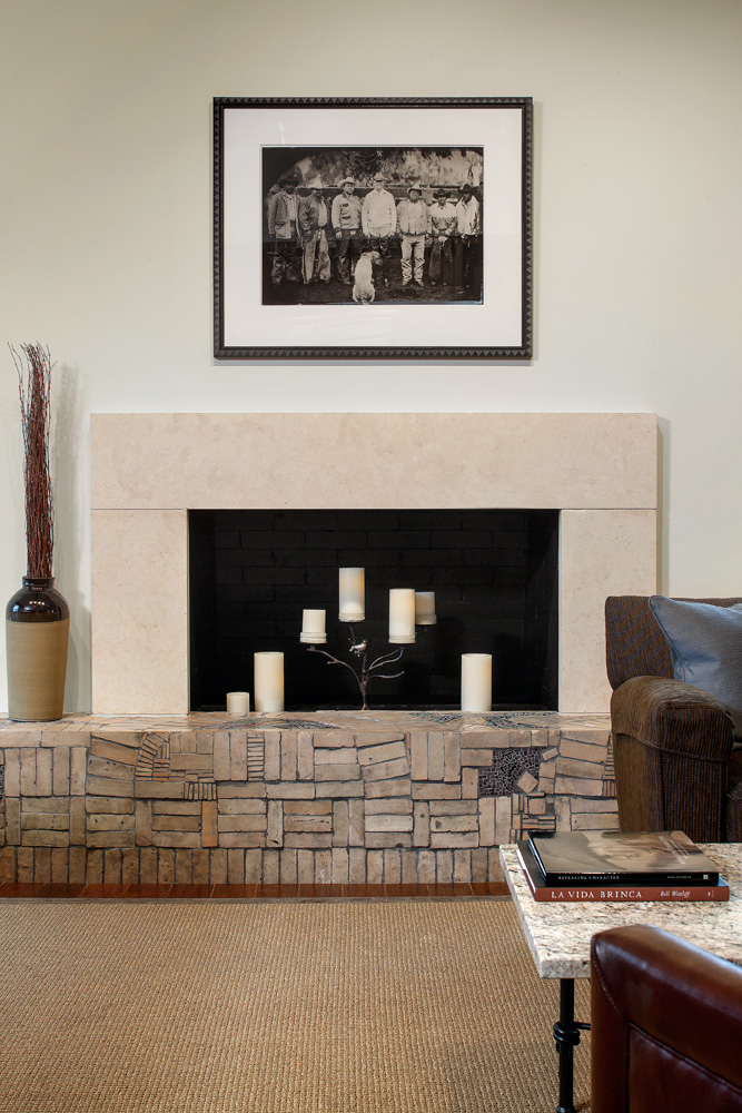 Candles inside a fireplace at a bank lobby.