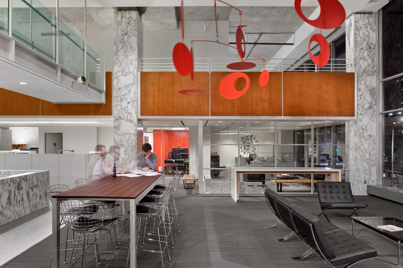 Lounge area and standing desk of an office building.