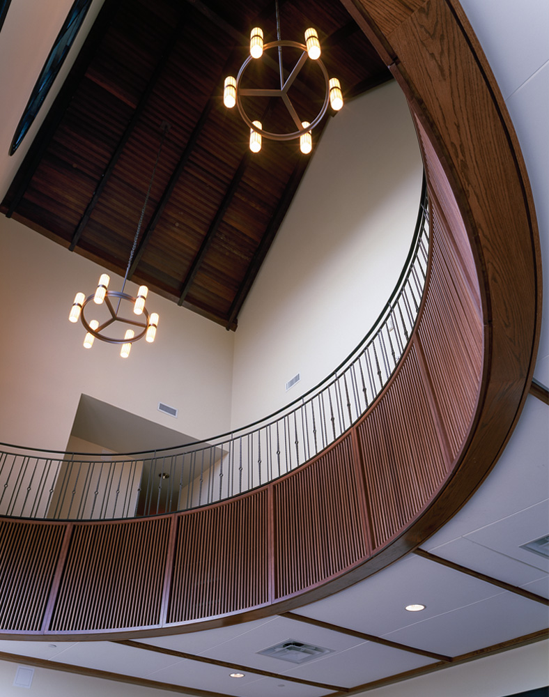 A curved second floor balcony.