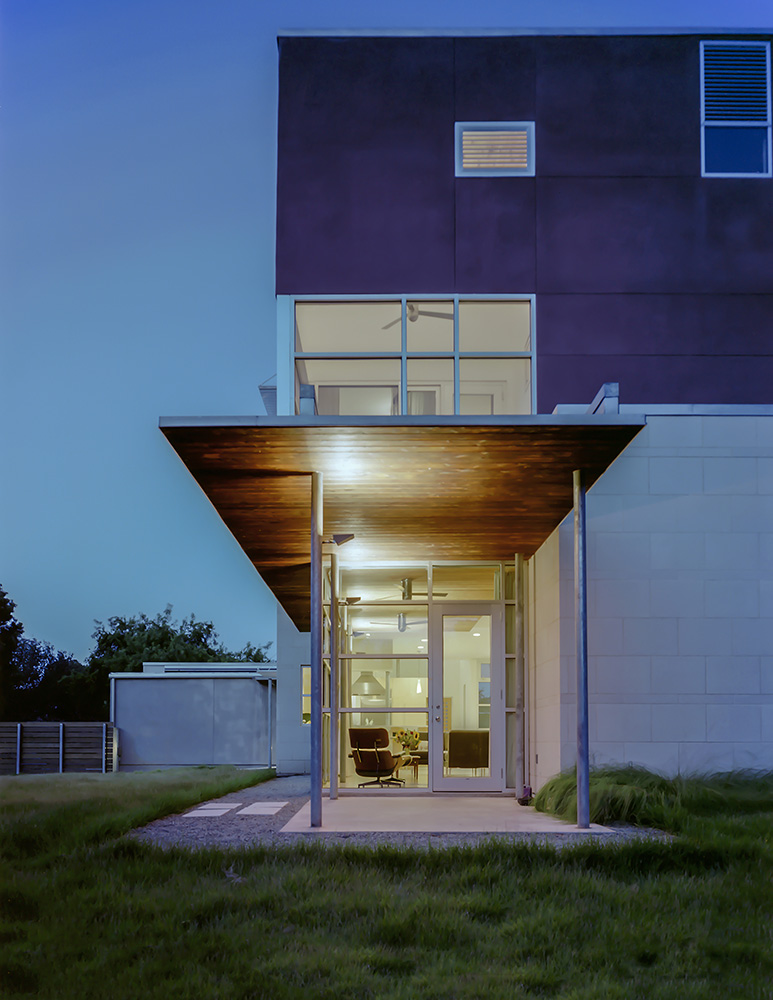 Backyard entrance to modern home.