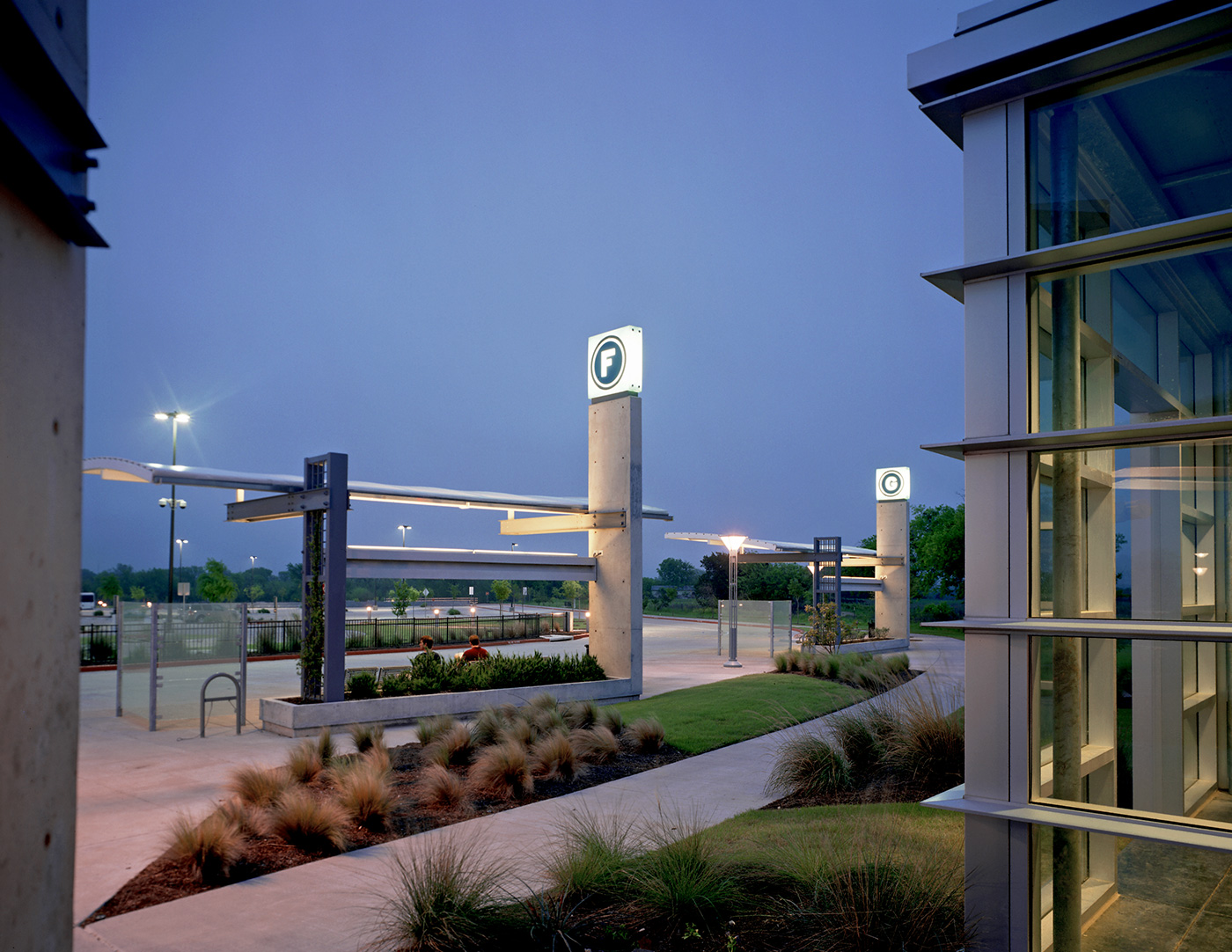 Multiple large awning bus stops.