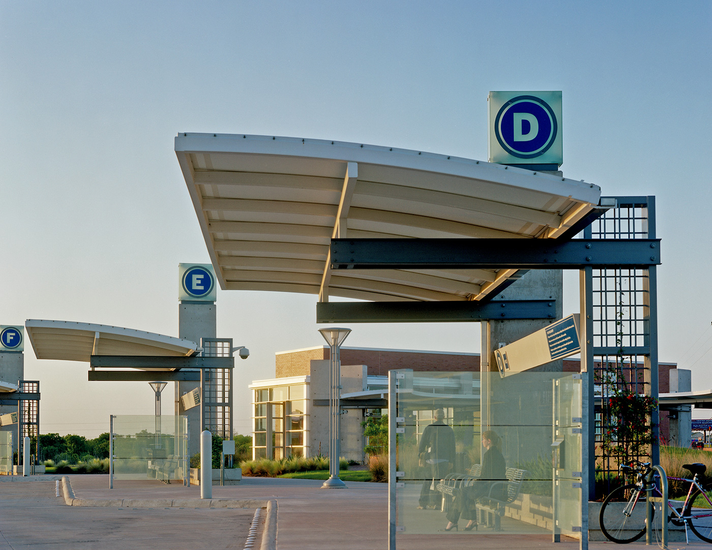 Multiple large awning bus stops.