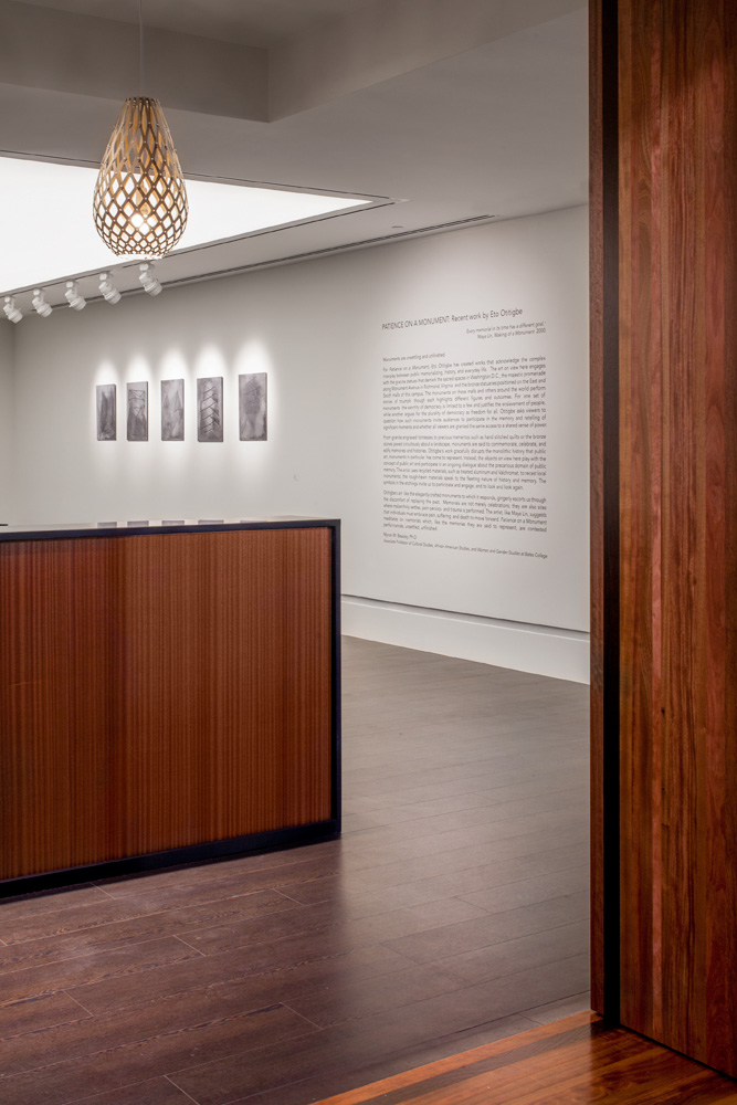 Wooden details on an art exhibits entrance.