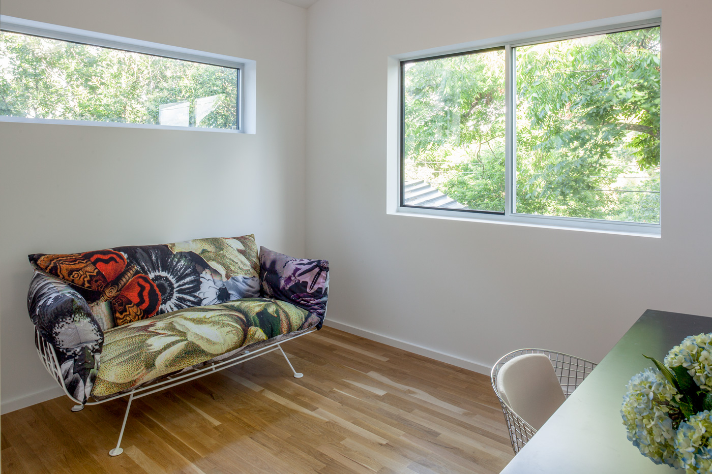 An accent in a small white room.