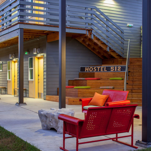 An exterior seating area of a hostel.