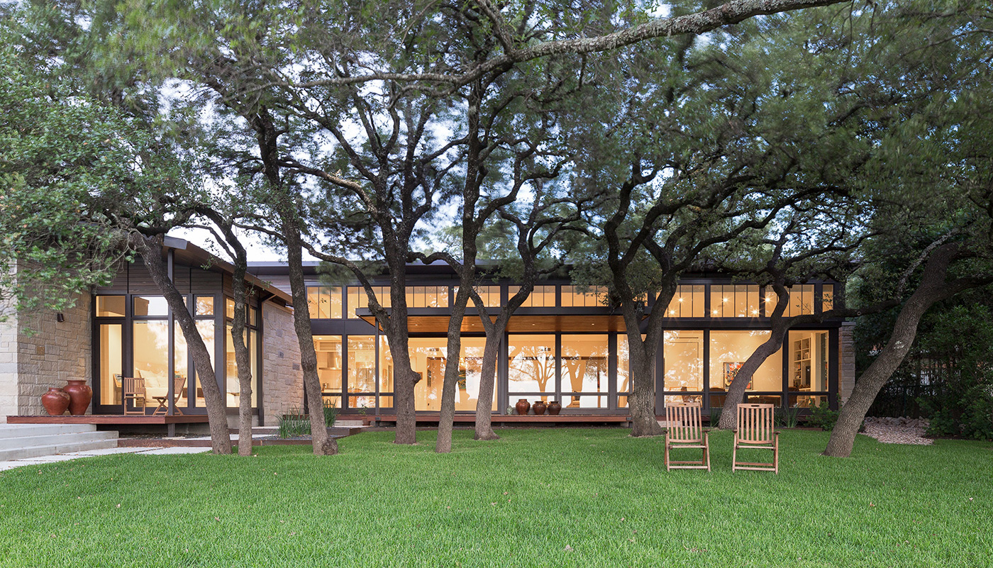 The view of a house from its backyard.