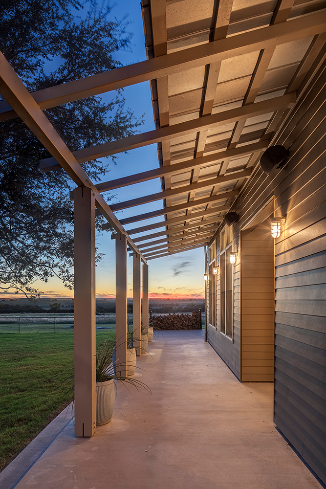 A wrap around concrete patio.