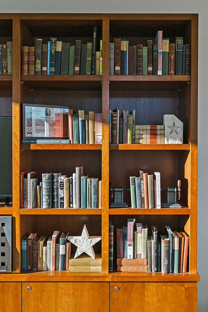 Wooden bookshelf with old books.