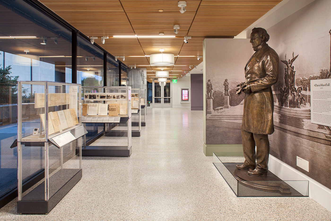 A hallway with display cases.