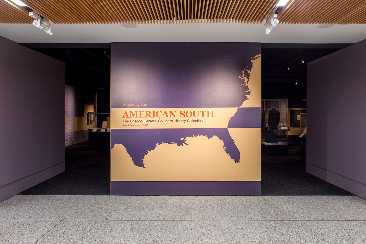 entrance to exhibit wall with graphic of the American south and large text that reads 