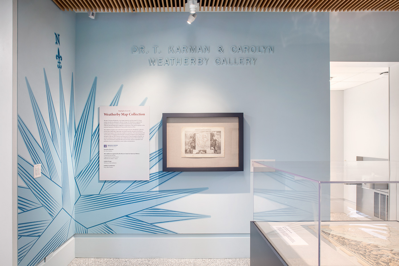 An interior wall that has Dr. T. Kartman & Carolyn Weatherby Gallery written on it.