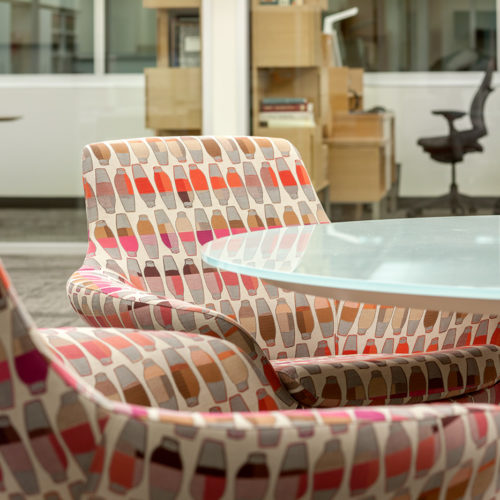 Chairs at table in office.