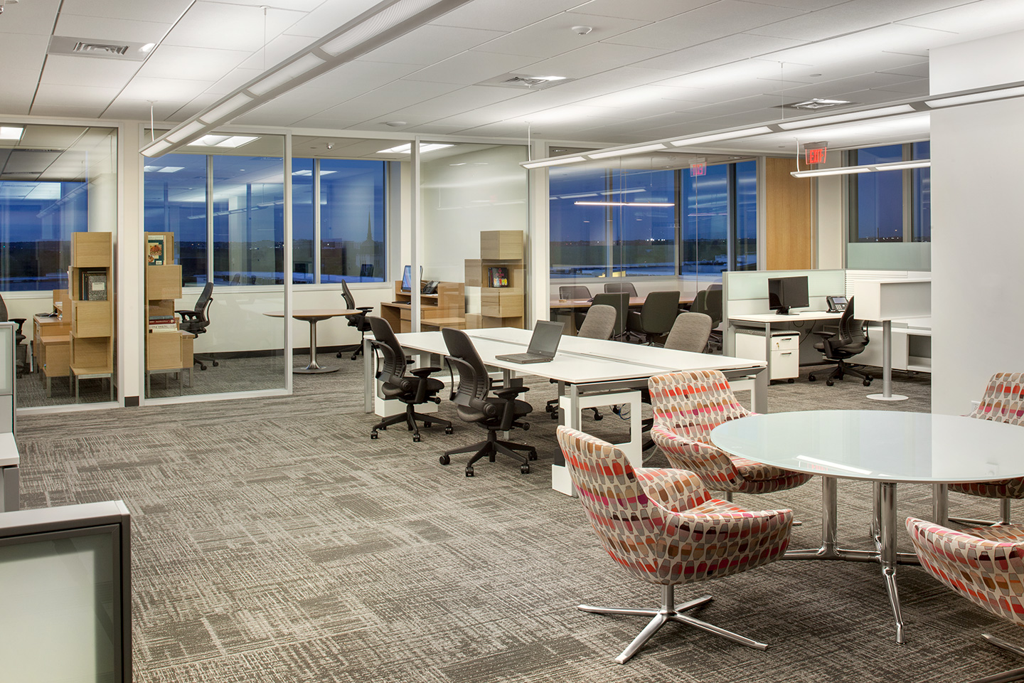 Office space with cubicles and diverses seating options.