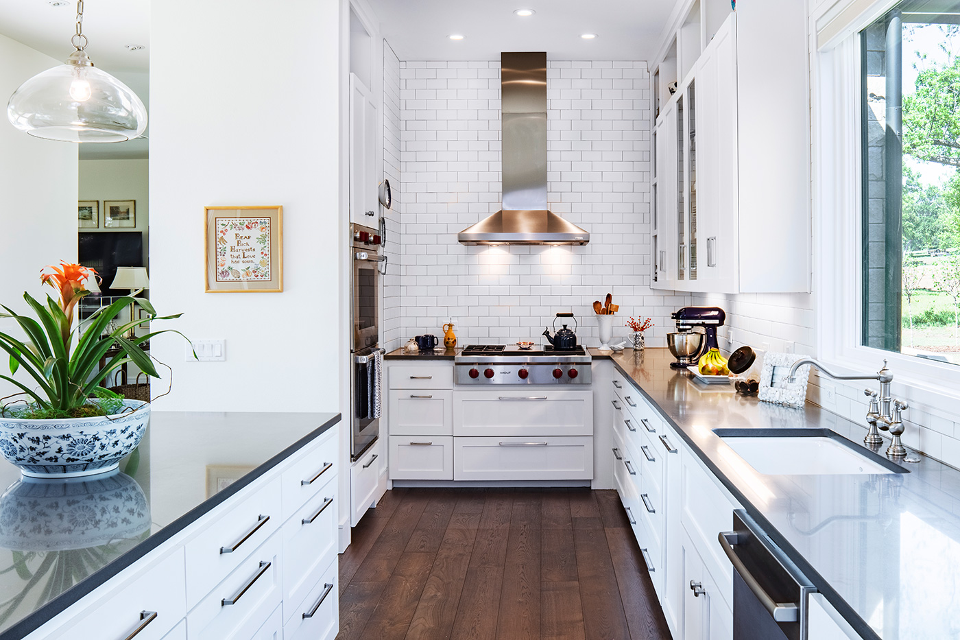 A stove and oven nook in a kitchen.