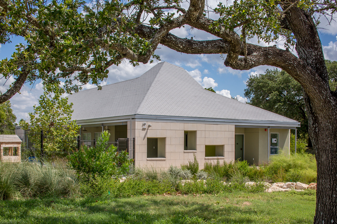 Building with slanted roof.