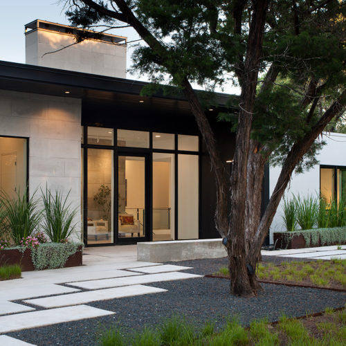 Front landscaping of a modern house.