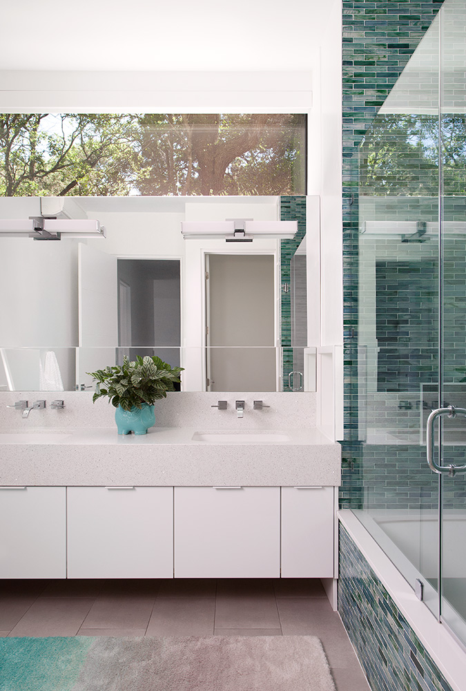 glass shower, and his & her sink of a bathroom.