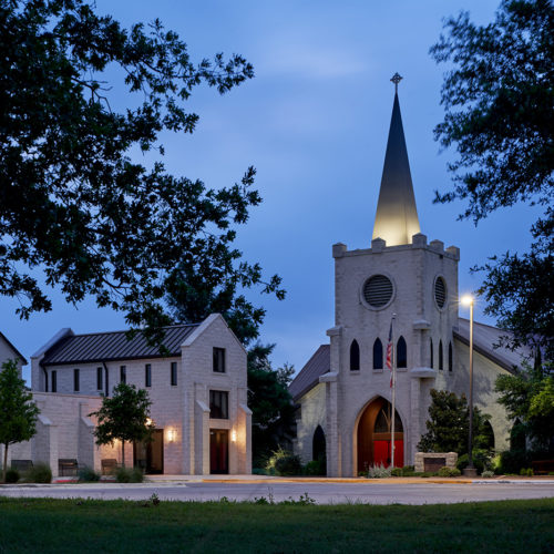 Front view of whole church compound at dusk.