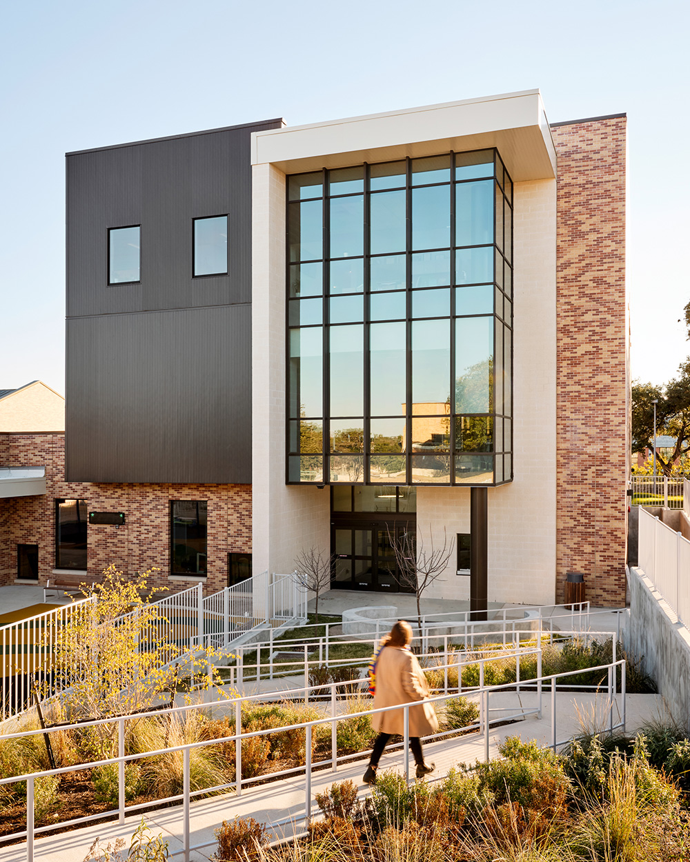 Accessibility ramp leading to the entrance of a building.