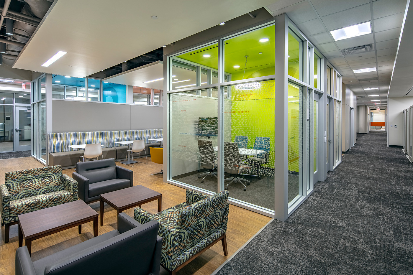Offices interior with diverse seating space arrangements.