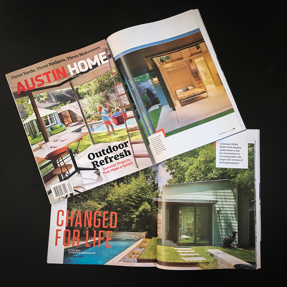 Two magazines opened up at feature a work of architecture.