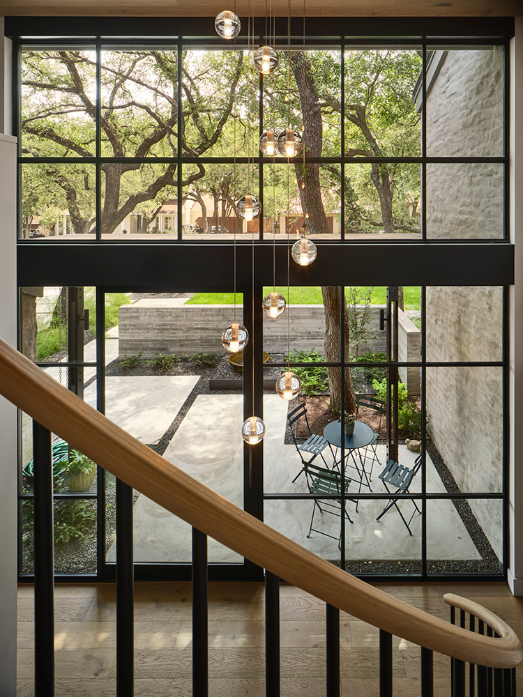 Large wall of window entrance to home.