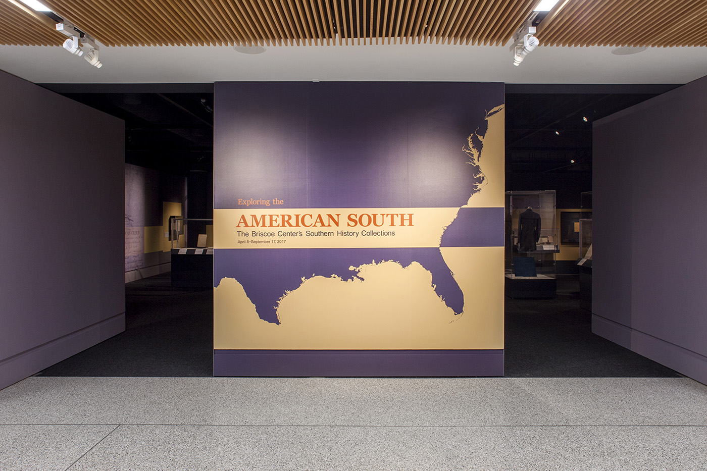 entrance to exhibit wall with graphic of the American south and large text that reads 