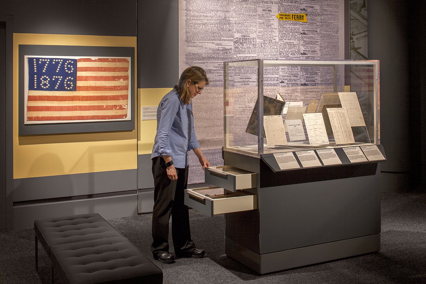 women looking at display draws.