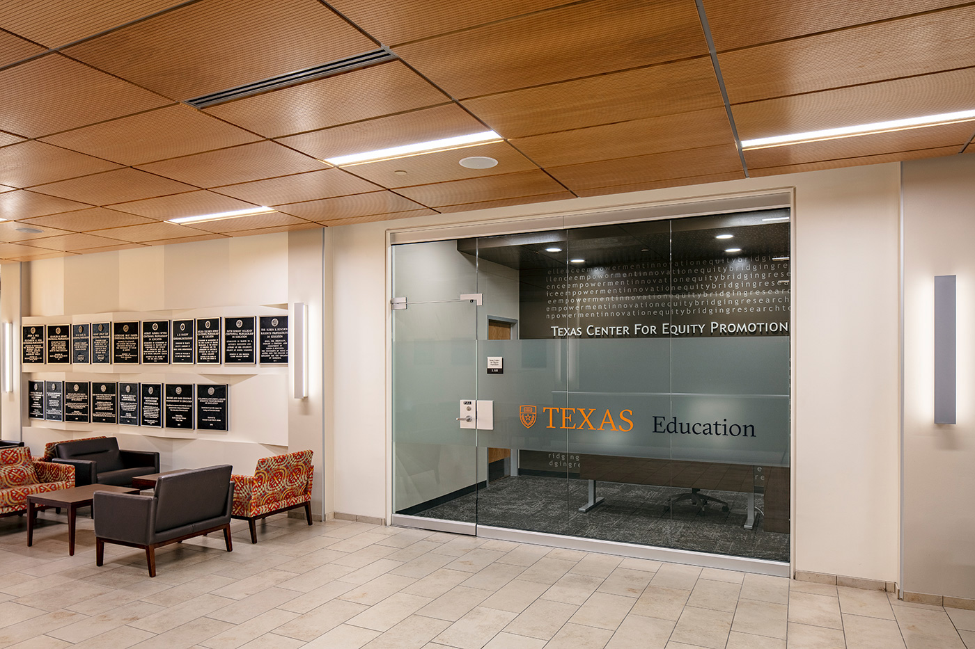 Glass entrance to the University of Texas College of Education Offices.
