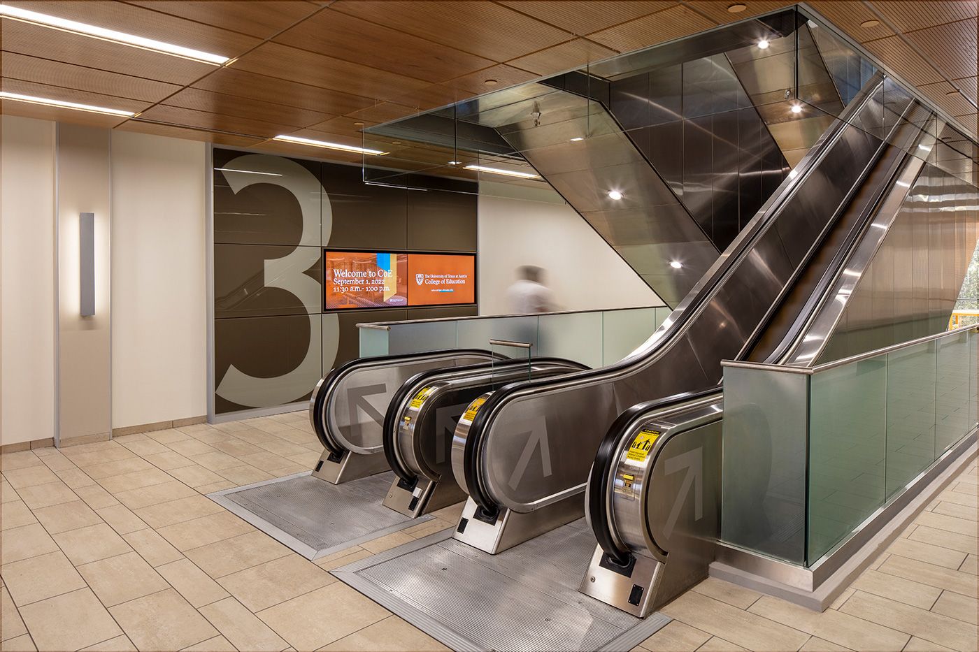 Metal escalator space through the third floor.