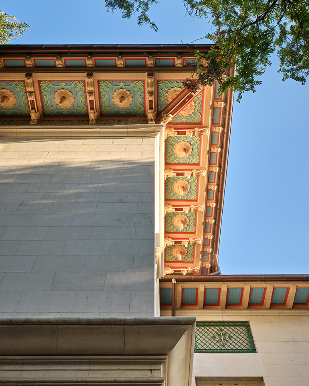 Re-painted soffits with detailed plaster carvings.