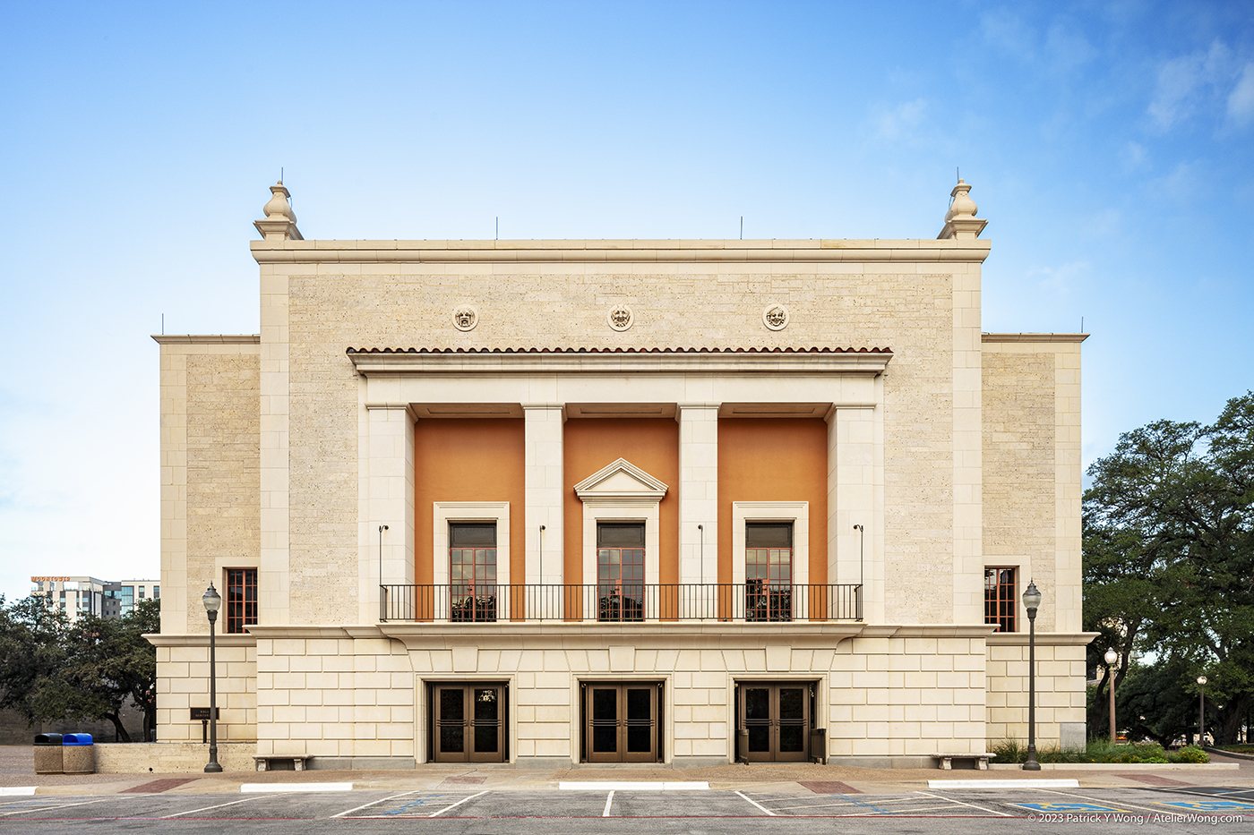 Exterior view of the front of a restored historic stone building.